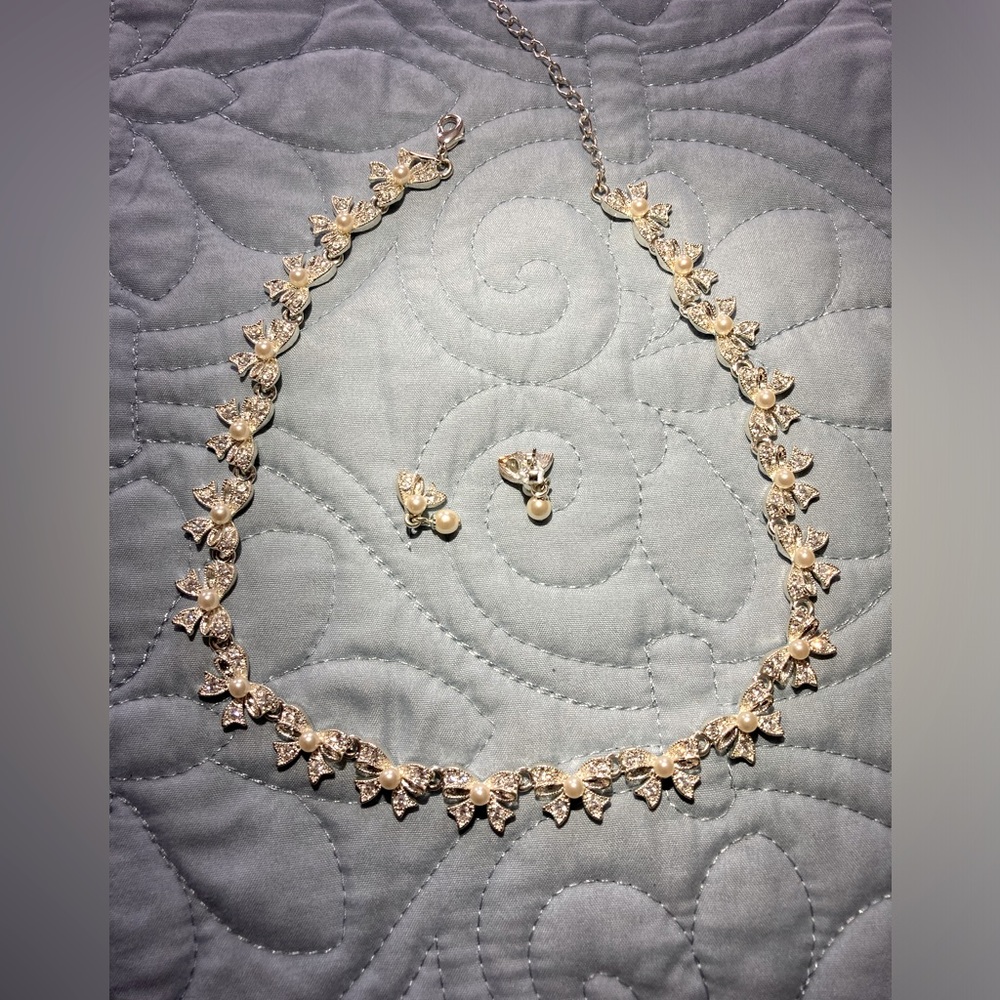 Avon ladies necklace and earrings set.  Formal.  Very pretty silver tone.